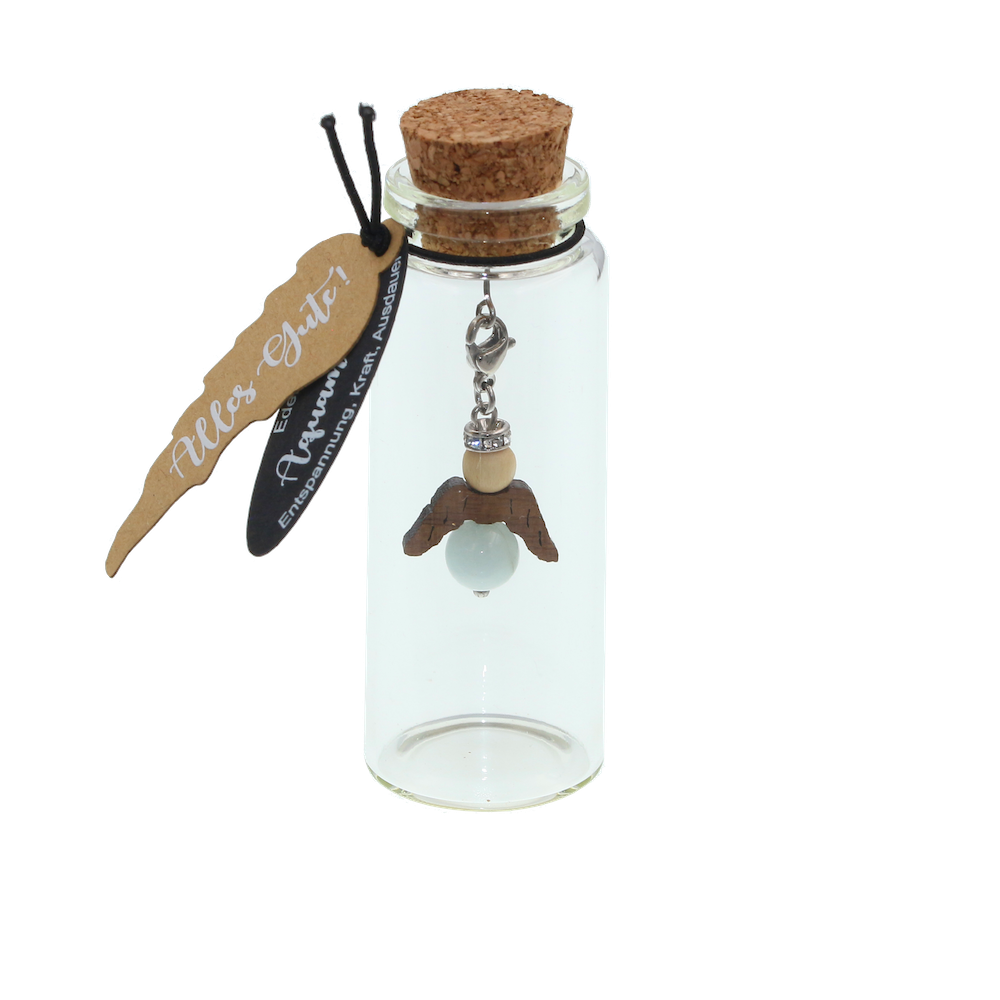 A guardian angel and companion made of walnut with sparkling crystal