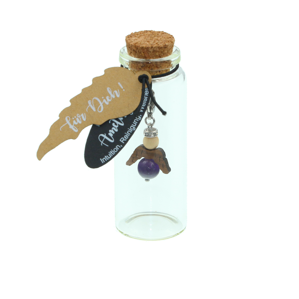 A guardian angel and companion made of walnut with sparkling crystal