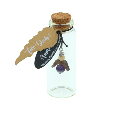 A guardian angel and companion made of walnut with sparkling crystal