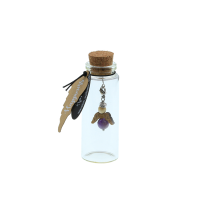 A guardian angel and companion made of walnut with sparkling crystal