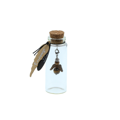 A guardian angel and companion made of walnut with sparkling crystal