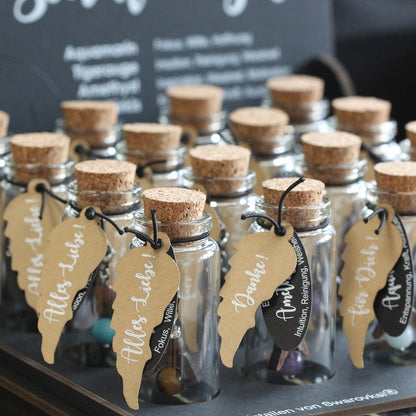 A guardian angel and companion made of walnut with sparkling crystal